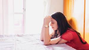 Woman Praying Earnestly